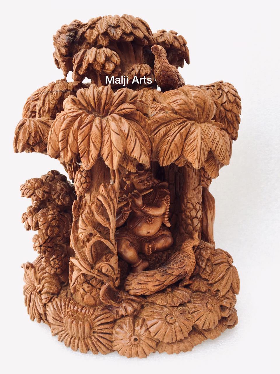 Sandalwood Baby krishna under tree playing flute - Arts99 - Online Art Gallery