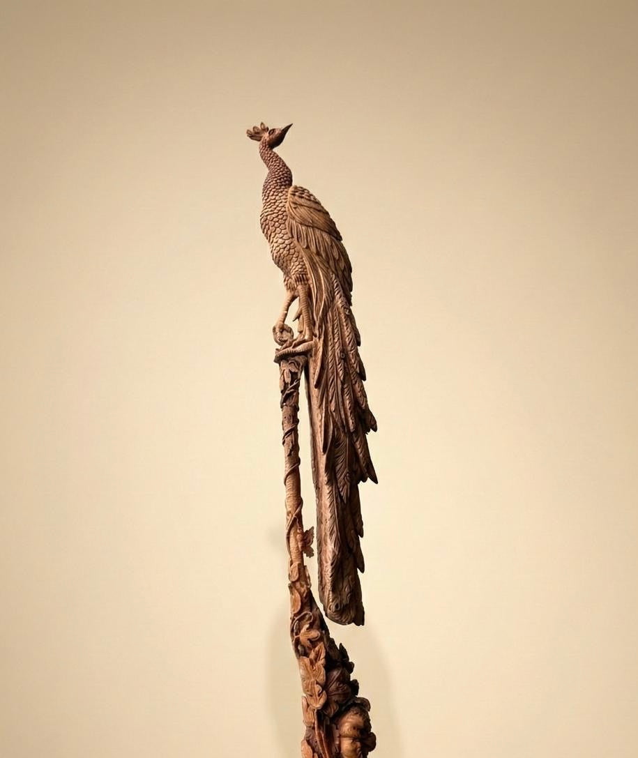 Sandalwood peacock with stick