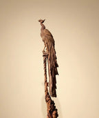 Sandalwood peacock with stick