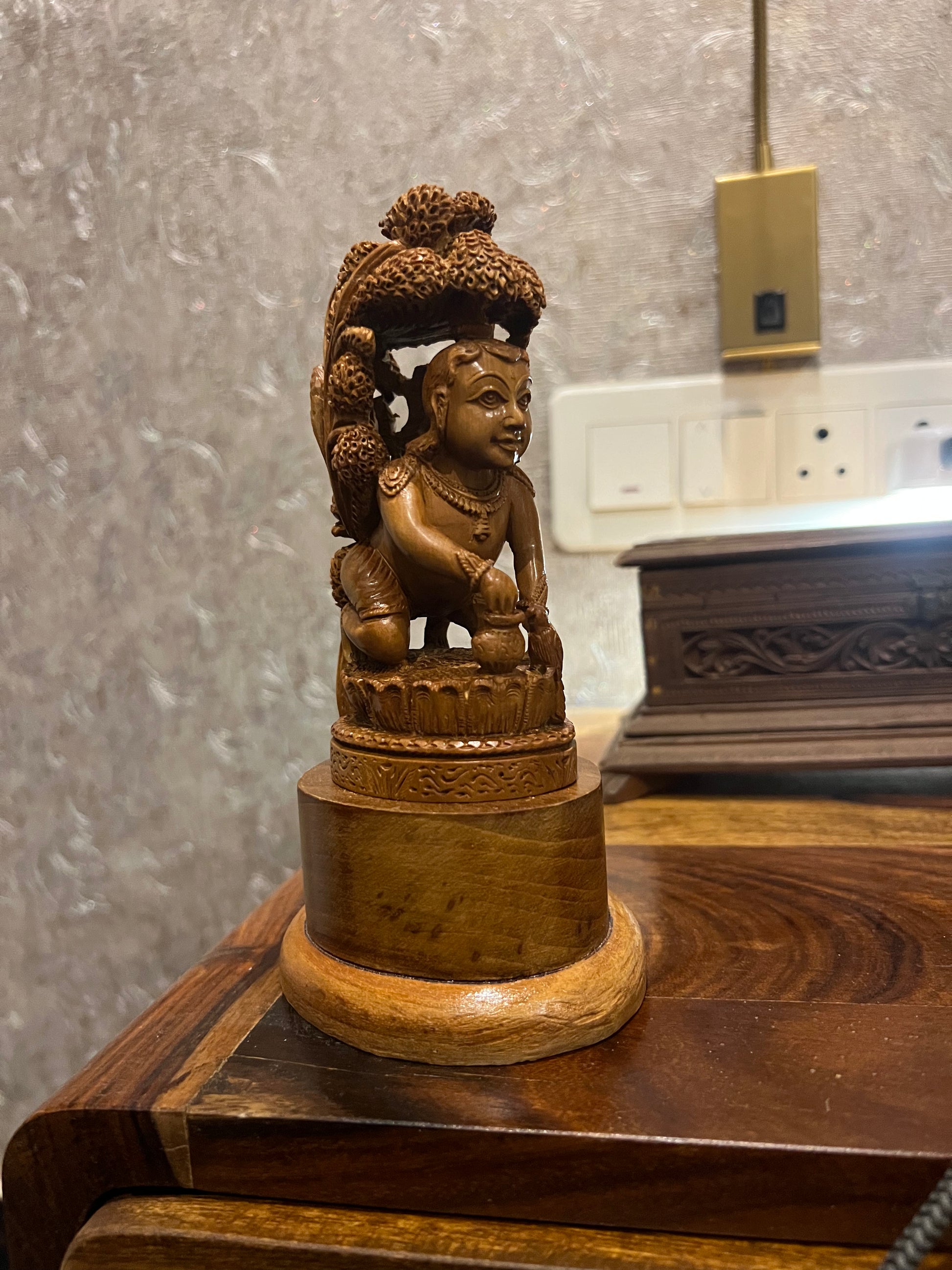 Sandalwood Baby Krishna Eating Makhan Under Tree
