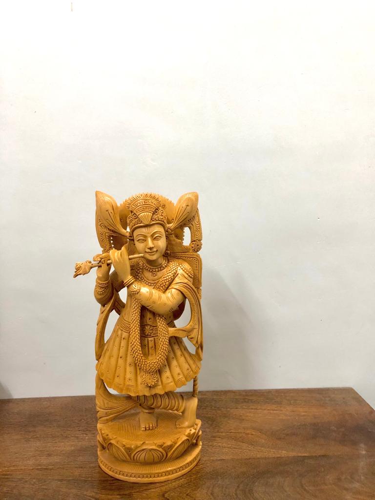 Wooden beautifully hand carved lord Krishna statue