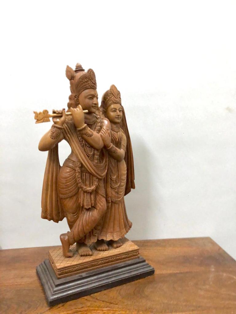 Sandalwood Special Carved Radha Krishna Statue Smiling Face