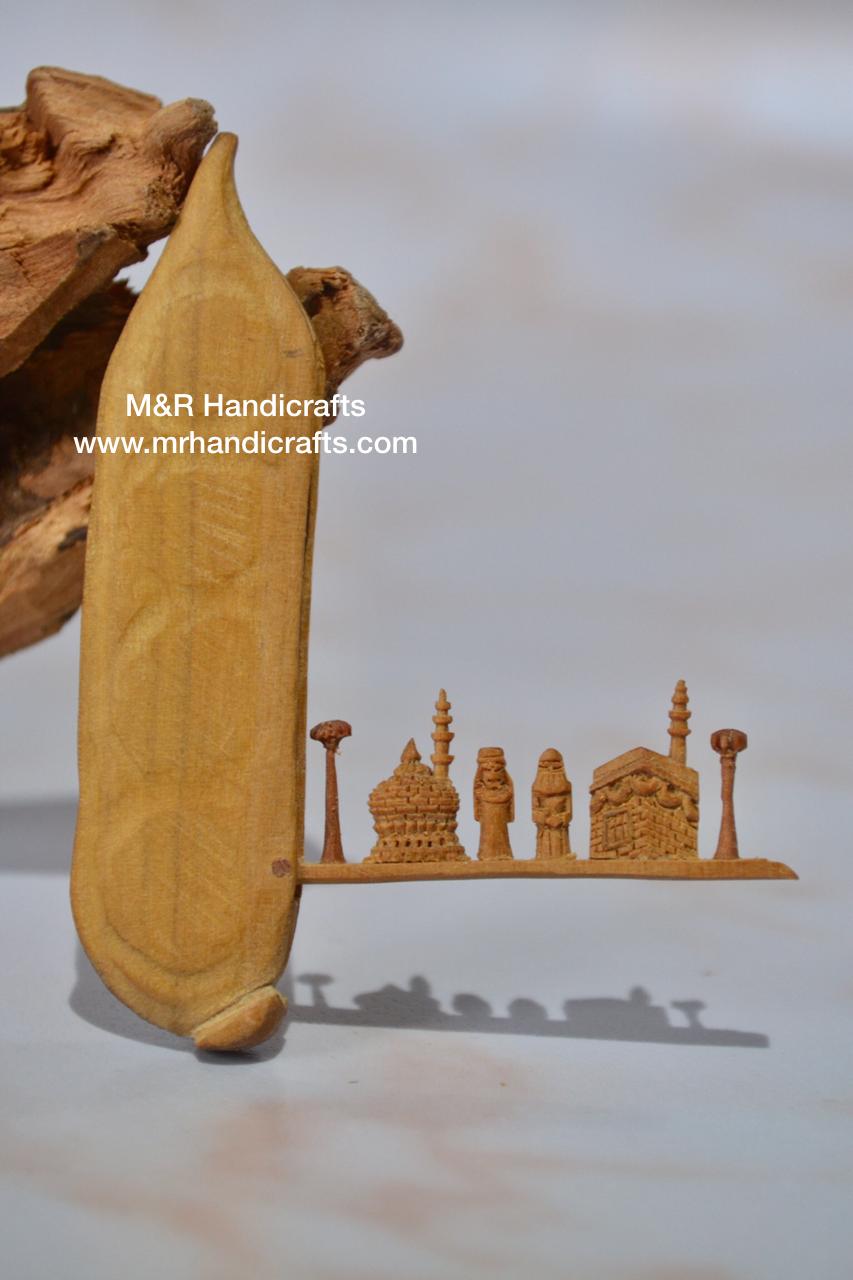 Sandalwood Miniature Carved Peapod Bean Features The Makkah Madina Inside - Arts99 - Online Art Gallery
