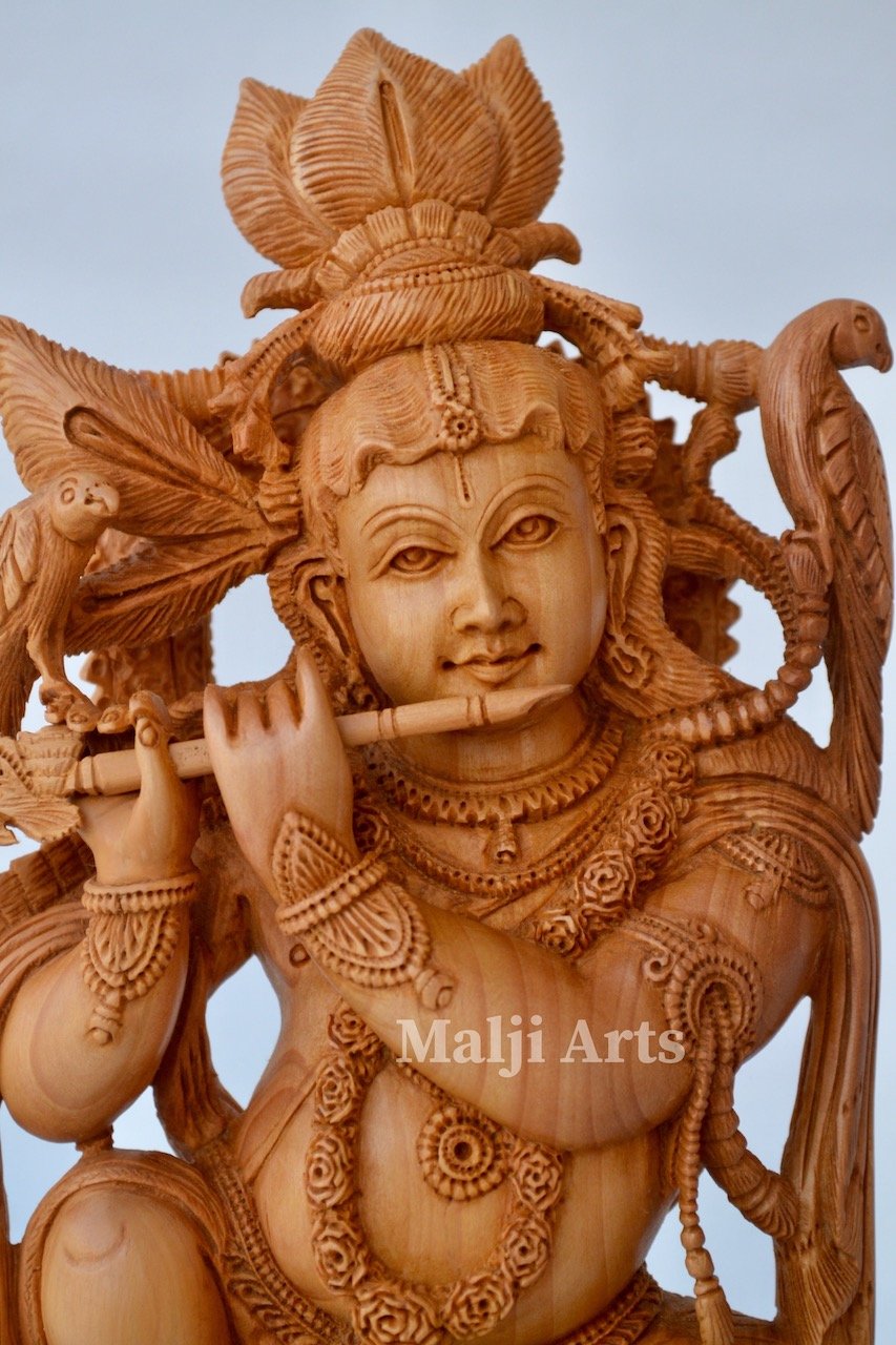 Baby Krishna sitting on snack fine wooden hand carved statue - Arts99 - Online Art Gallery