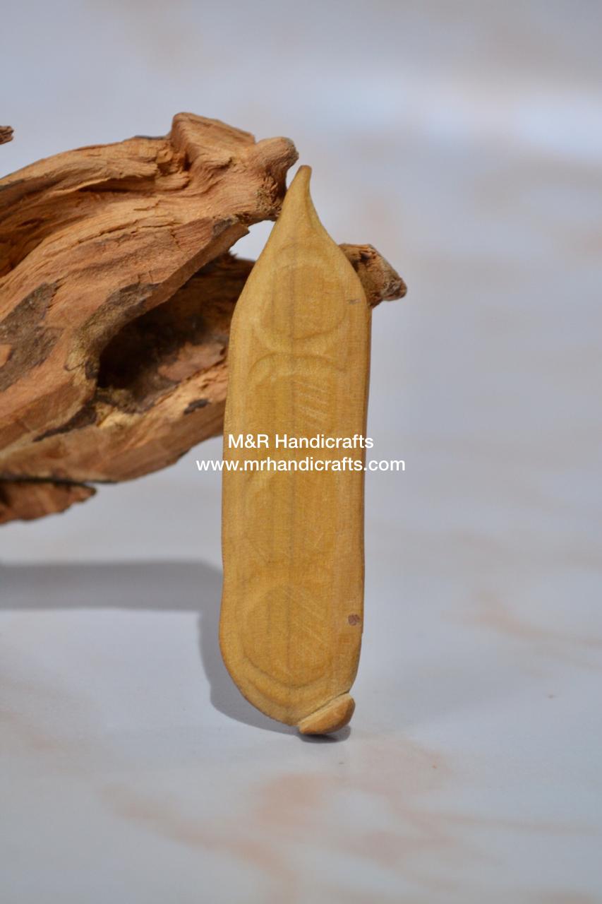 Sandalwood Miniature Carved Peapod Bean Features The Makkah Madina Inside - Arts99 - Online Art Gallery