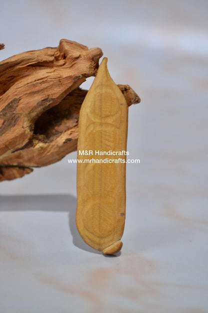 Sandalwood Miniature Carved Peapod Bean Features The Makkah Madina Inside - Arts99 - Online Art Gallery
