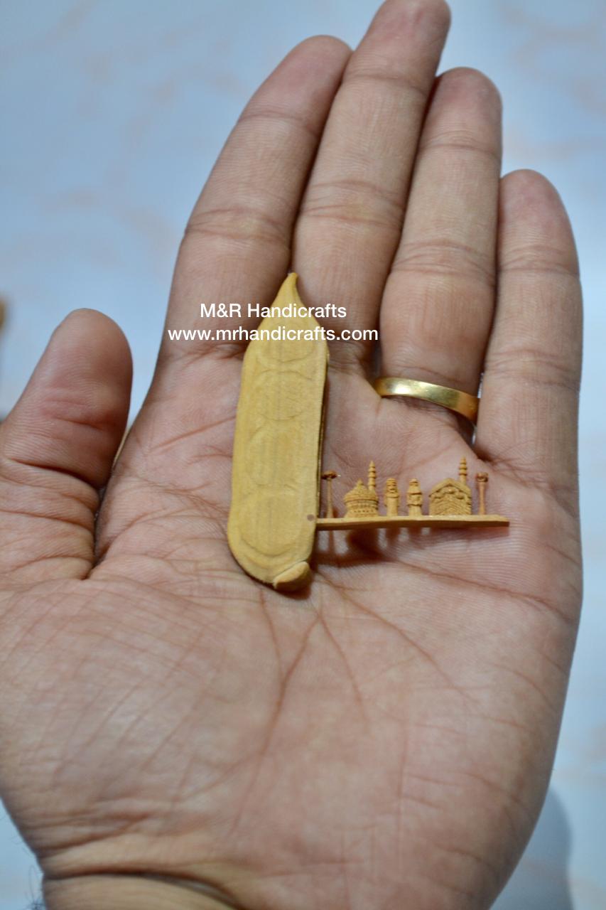 Sandalwood Miniature Carved Peapod Bean Features The Makkah Madina Inside - Arts99 - Online Art Gallery