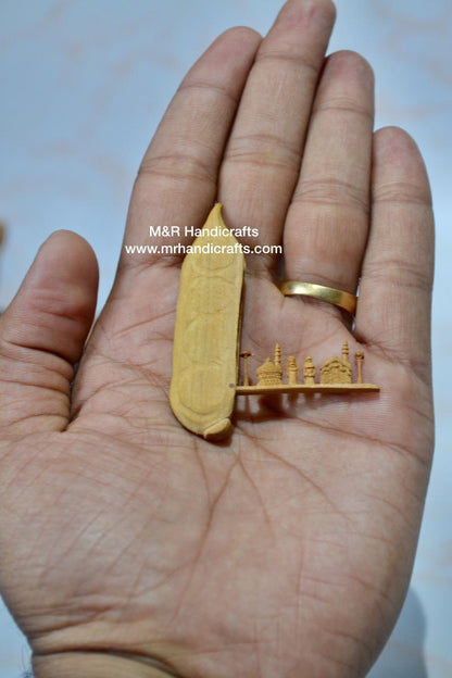 Sandalwood Miniature Carved Peapod Bean Features The Makkah Madina Inside - Arts99 - Online Art Gallery
