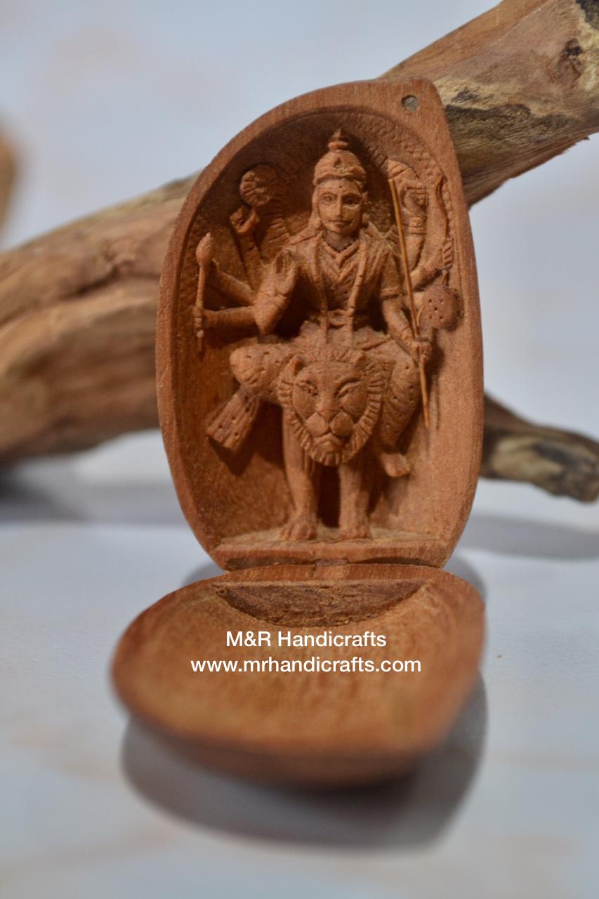 Sandalwood Carved Opening Almond Depicted Durga Statue Carved Inside - Arts99 - Online Art Gallery