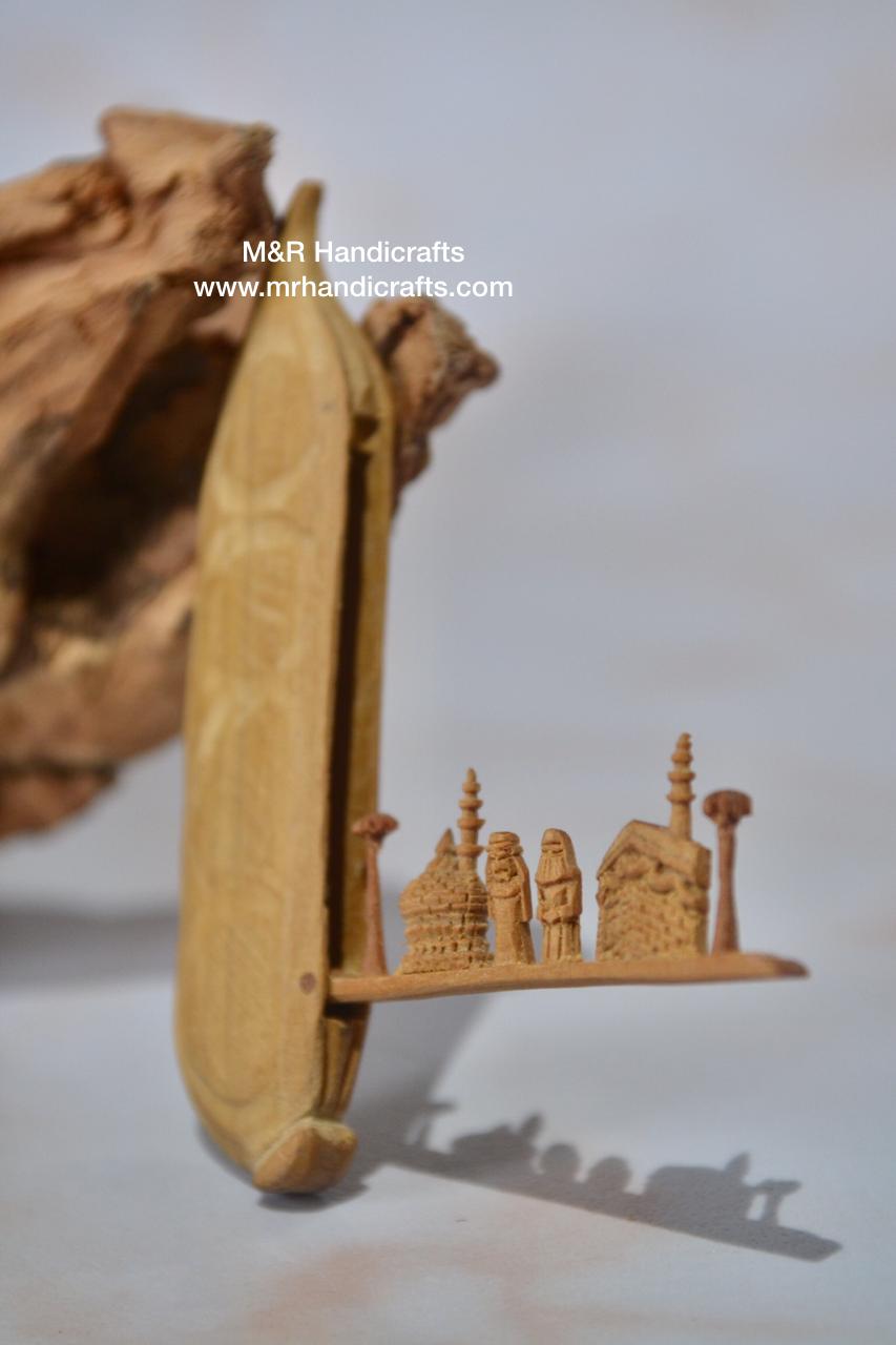Sandalwood Miniature Carved Peapod Bean Features The Makkah Madina Inside - Arts99 - Online Art Gallery