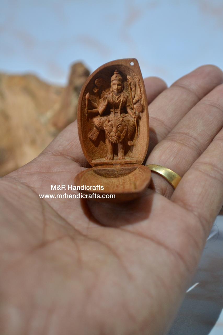 Sandalwood Carved Opening Almond Depicted Durga Statue Carved Inside - Arts99 - Online Art Gallery